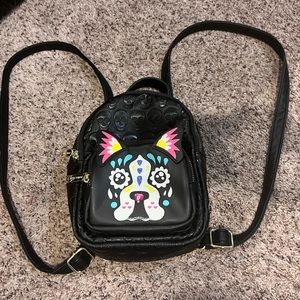 Mini backpack 🖤 Betsey Johnson black skulls 💀with splash of color dog graphic